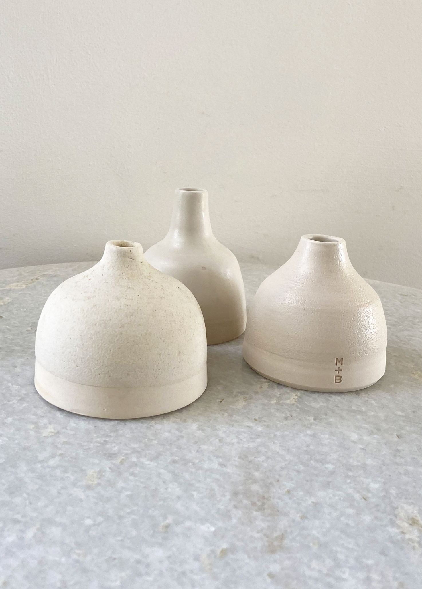 Squat vases by Gill Marles